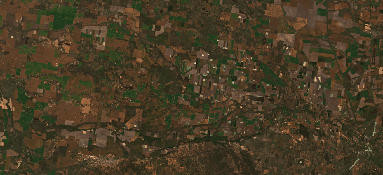 Satellite imagery showing land and water features with highlighted areas